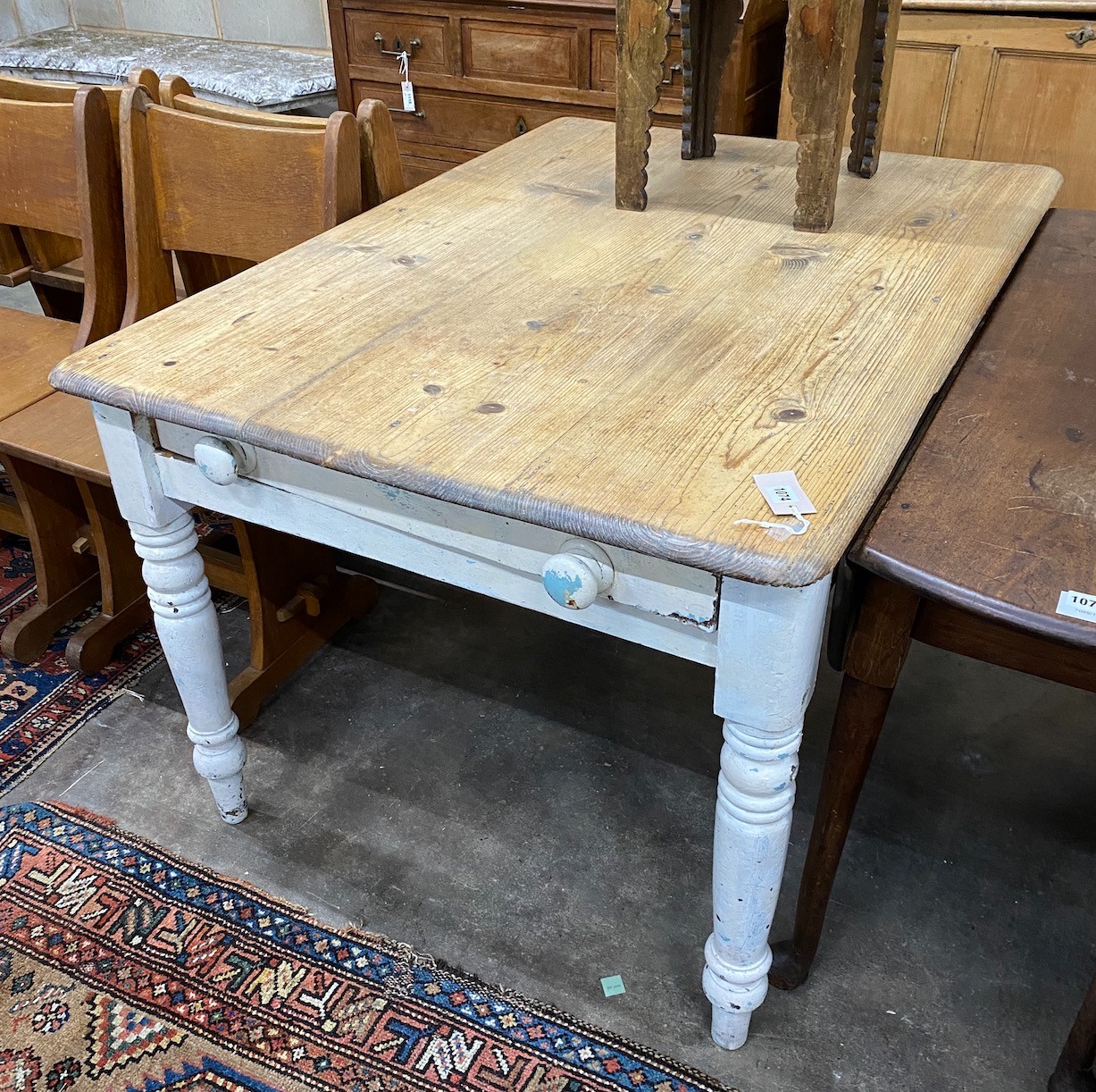 A Victorian pine and later painted kitchen table, with frieze drawer, width 122cm depth 87cm